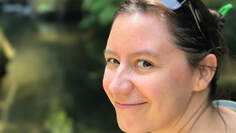 Headshot of Catalina in front of plants